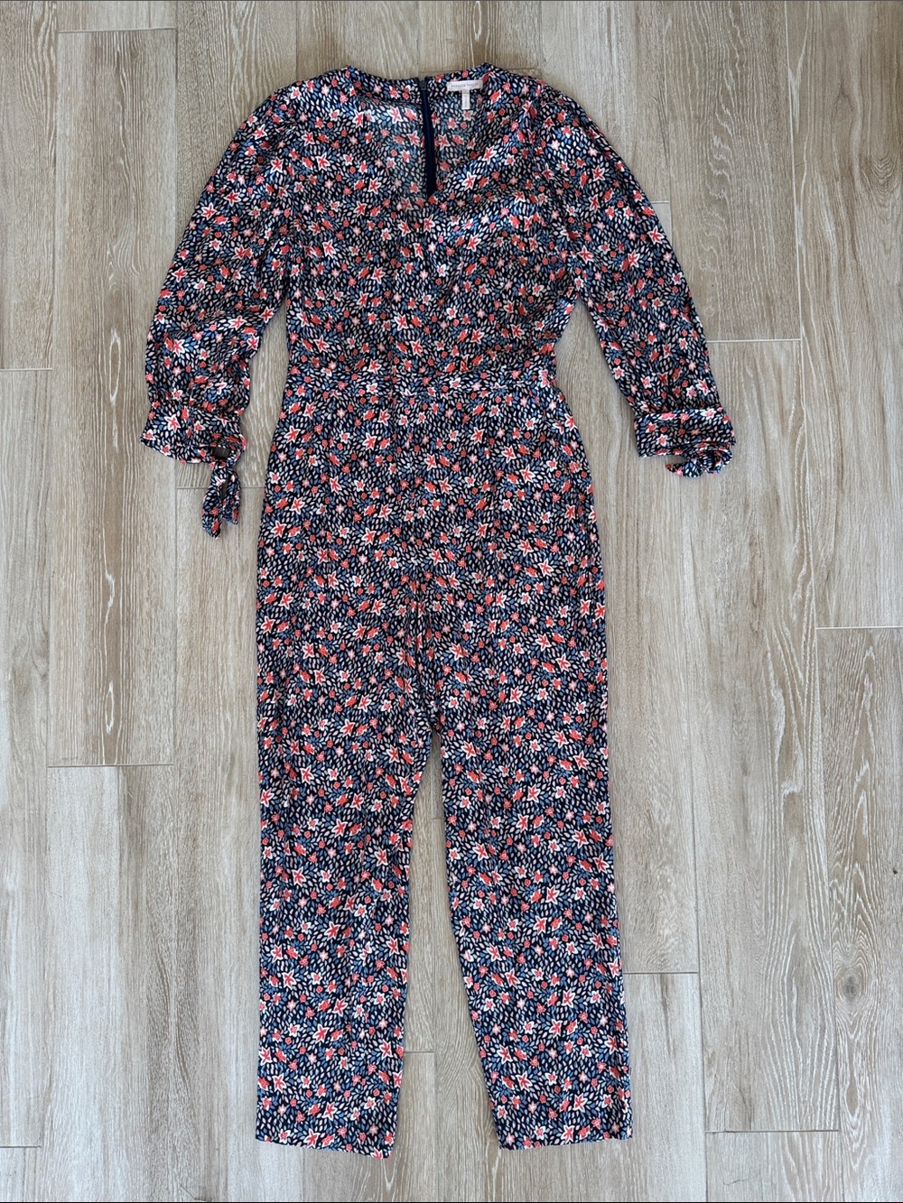 Floral V-Neck Long Sleeve Jumpsuit in Navy with Coral Accents - Picture 4 of 16